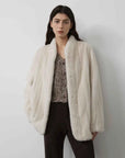 Warm Coffee Pearl Beige long mink jacket on model