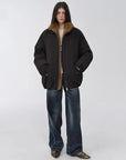 Model wearing Fireladyfur Warm Dialogue Black two-tone fur down parka relaxed front view