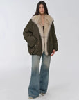 Full-length front view of Fireladyfur Warm Dialogue Army Green fox fur down parka on model