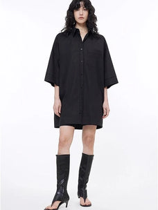 Black oversized paneled pullover shirt on model