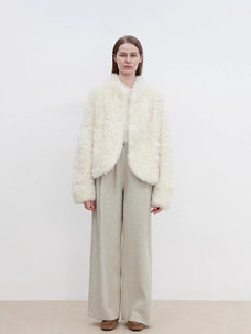 Front model view of Yorta white curly shearling jacket