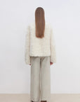 Back model view of Yorta white Toscana shearling jacket