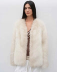 Model wearing Yukino Dream Agate Fox natural color coat, front view