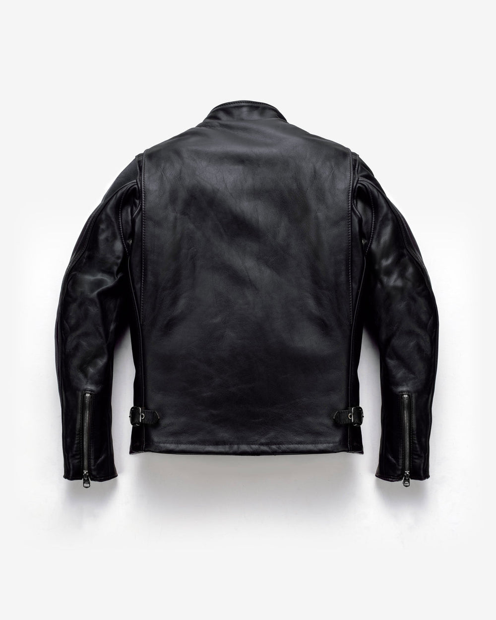 Rear view of a black Schott 141 leather jacket with folded panels beside the back armholes