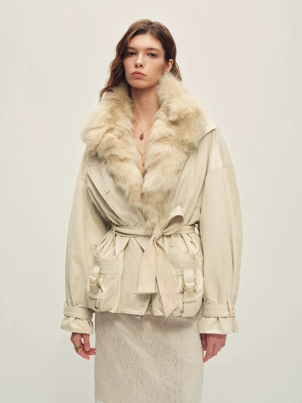 Beige Gray three-way parka worn belted, with fur at the neck and front opening and fabric body and sleeves