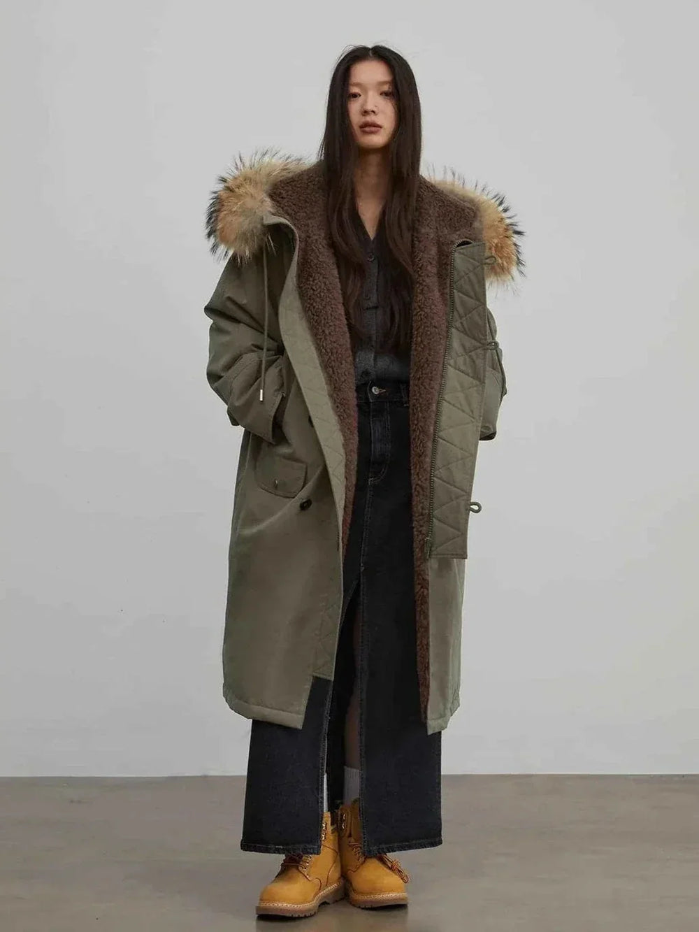 Actual Manchester City Old Story parka on a model, with full body, hood and hem visible.