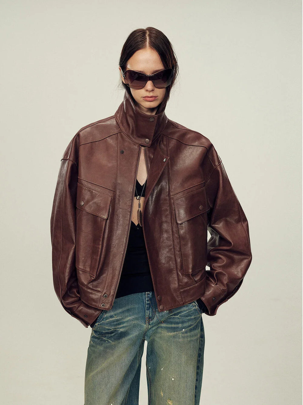 Side view of a leather jacket used to assess drape, body length and everyday movement