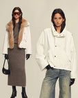Model wearing Firelady Fur Epoch Winter white fur collar parka with coyote raccoon Tokay trim