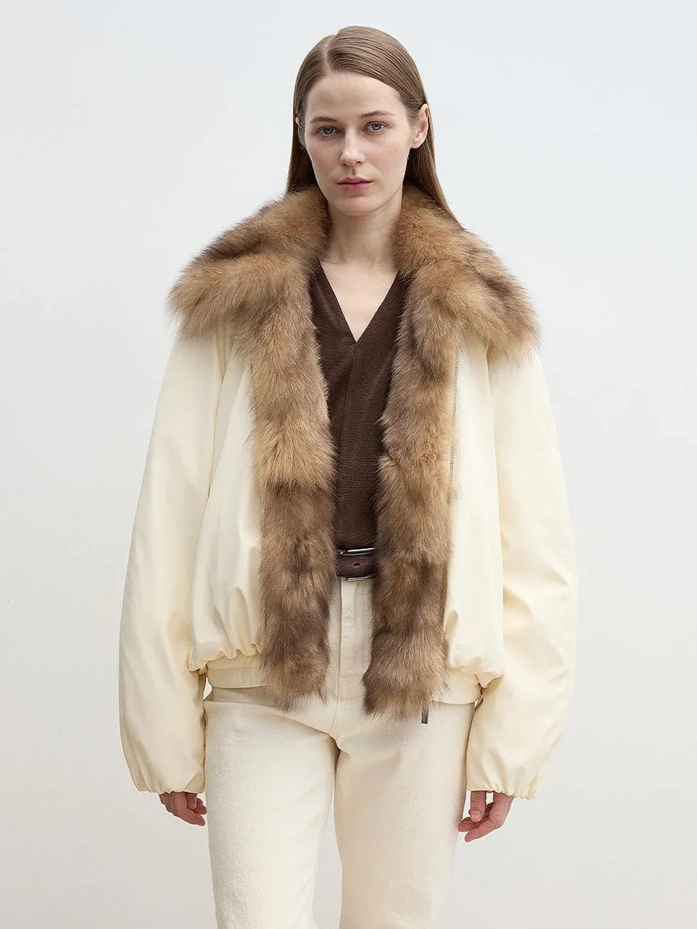 Model wearing Fireladyfur Day and Night Rider off-white detachable fox fur collar down jacket