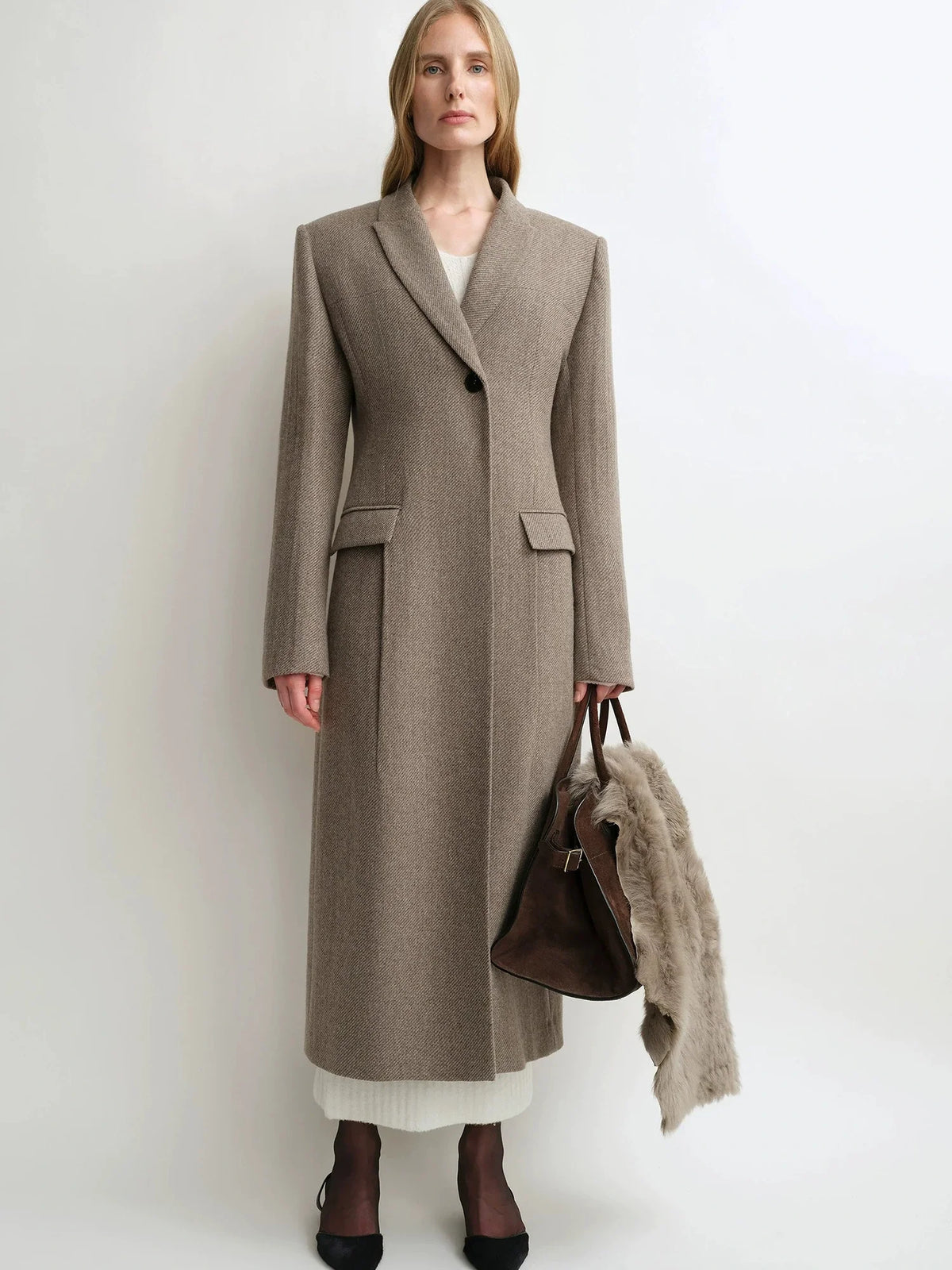 THE ARTM taupe brown 100% wool peak lapel long coat styled on model