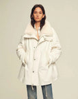 Model wearing Firelady Fur Ode to the Stars white down parka with detachable Tokaj fur collar front view