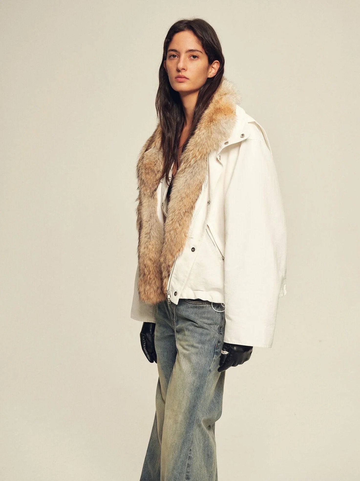 Side view of Firelady Fur Epoch Winter white fur collar parka styled with denim