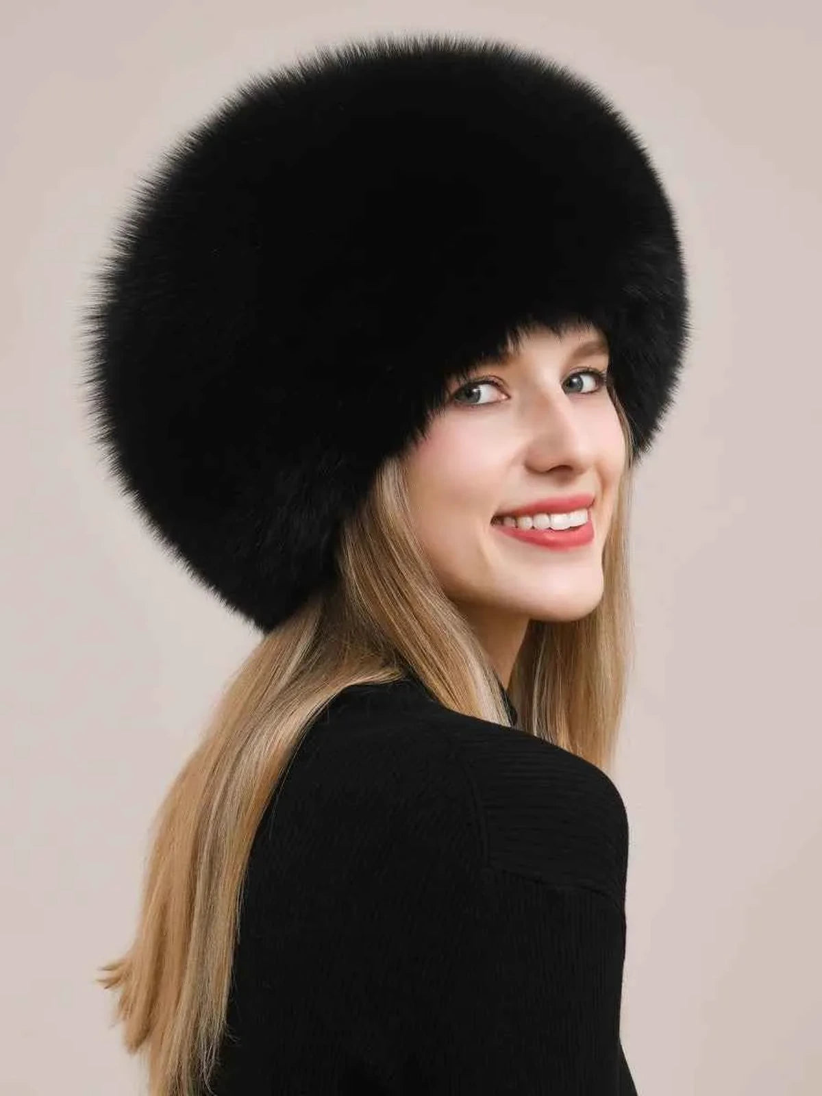 Women's fox fur hat with earmuffs in Black – styled on model | Firelady Fur