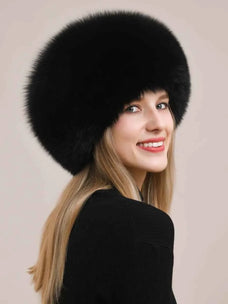 Women's fox fur hat with earmuffs in Black – styled on model | Firelady Fur
