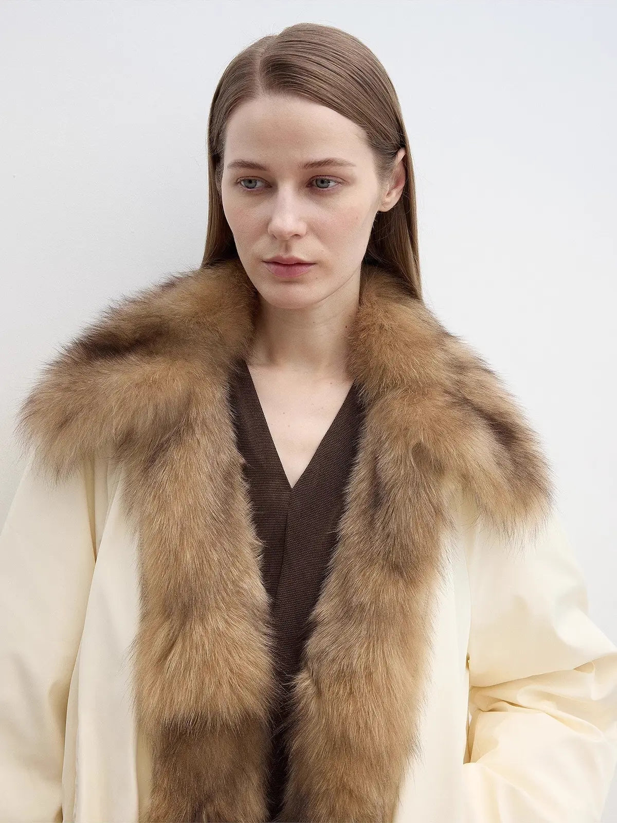 Close-up of Fireladyfur Day and Night Rider off-white down jacket with contrasting fox fur collar