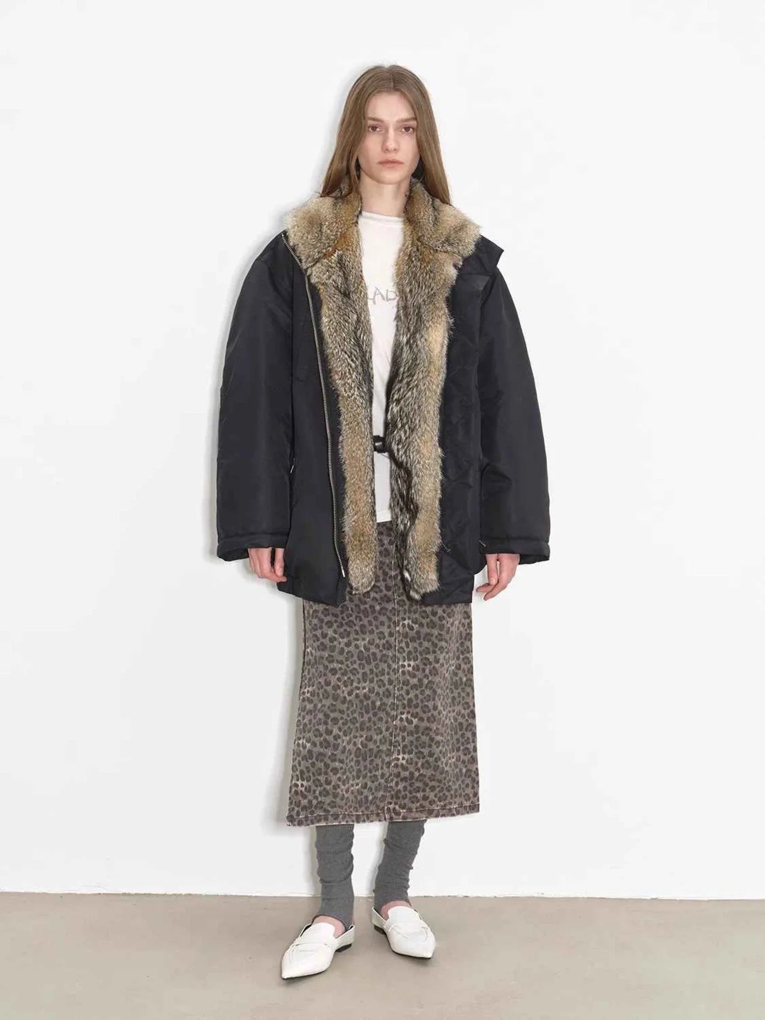Full-body model view of Fireladyfur Travel Notes black down jacket with fluffy fox fur collar