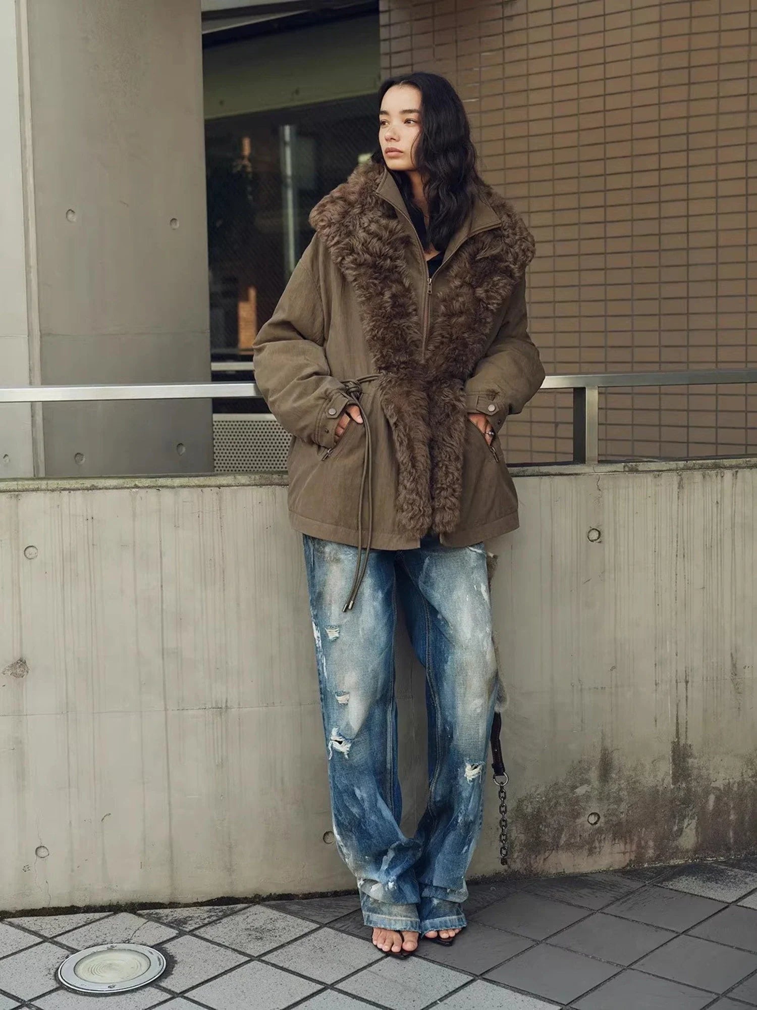 Street styling of Firelady Fur The Wizard of Oz gray green Toscana shearling lined parka jacket