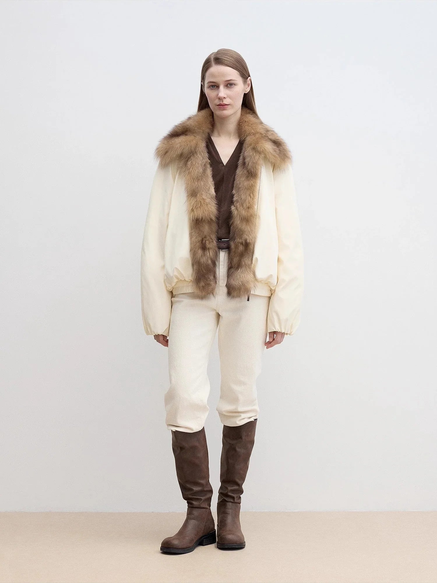 Full-body front model view of Fireladyfur Day and Night Rider off-white down jacket with fox fur collar