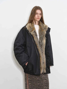 Close model view of Fireladyfur Travel Notes black down jacket with fluffy fox fur collar