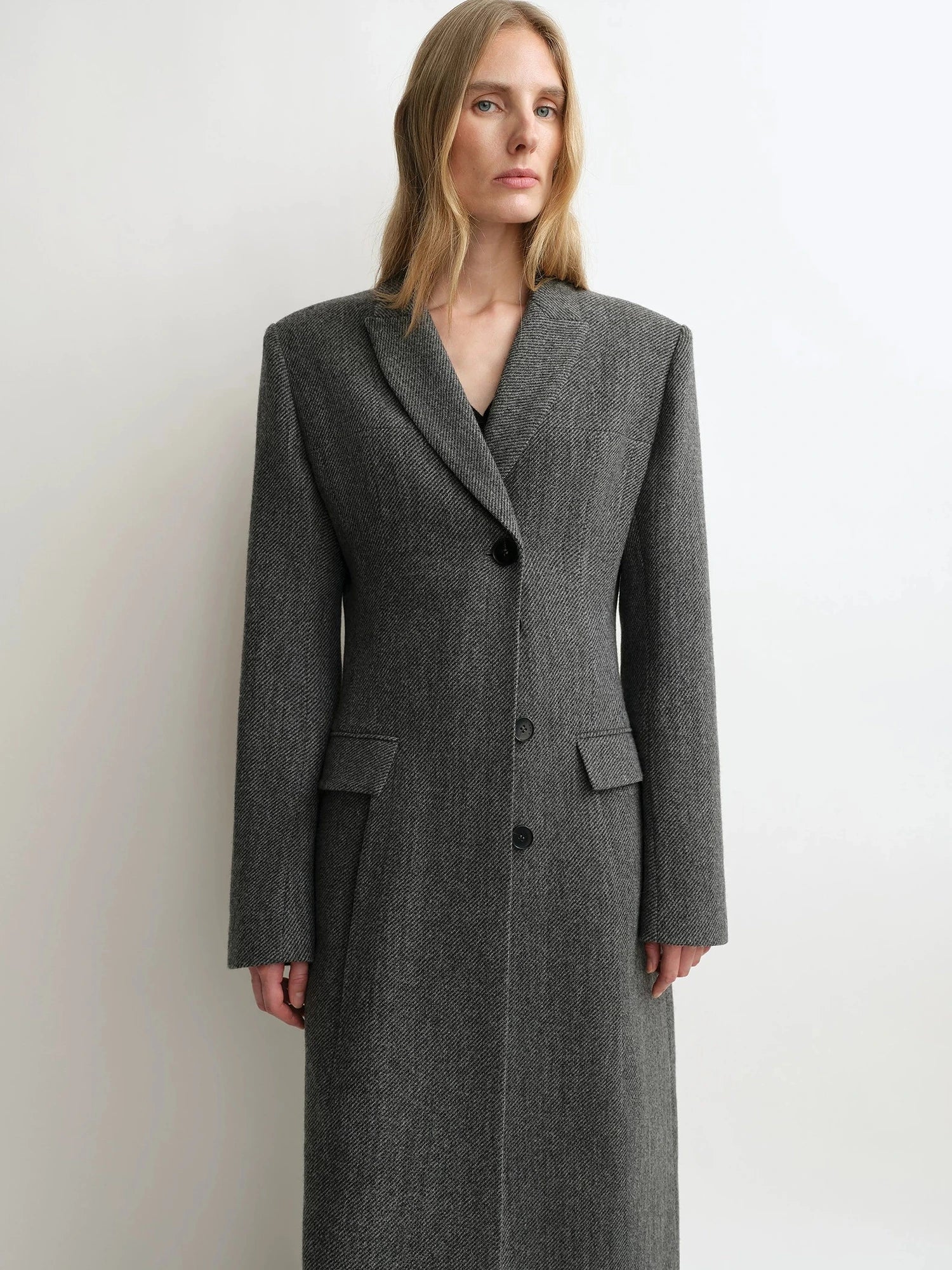 THE ARTM charcoal gray wool peak lapel long coat upper body view