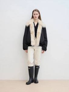 Full-body front model view of Fireladyfur Day and Night Rider black down jacket with contrasting fox fur collar