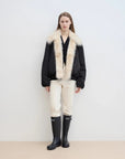 Full-body front model view of Fireladyfur Day and Night Rider black down jacket with contrasting fox fur collar