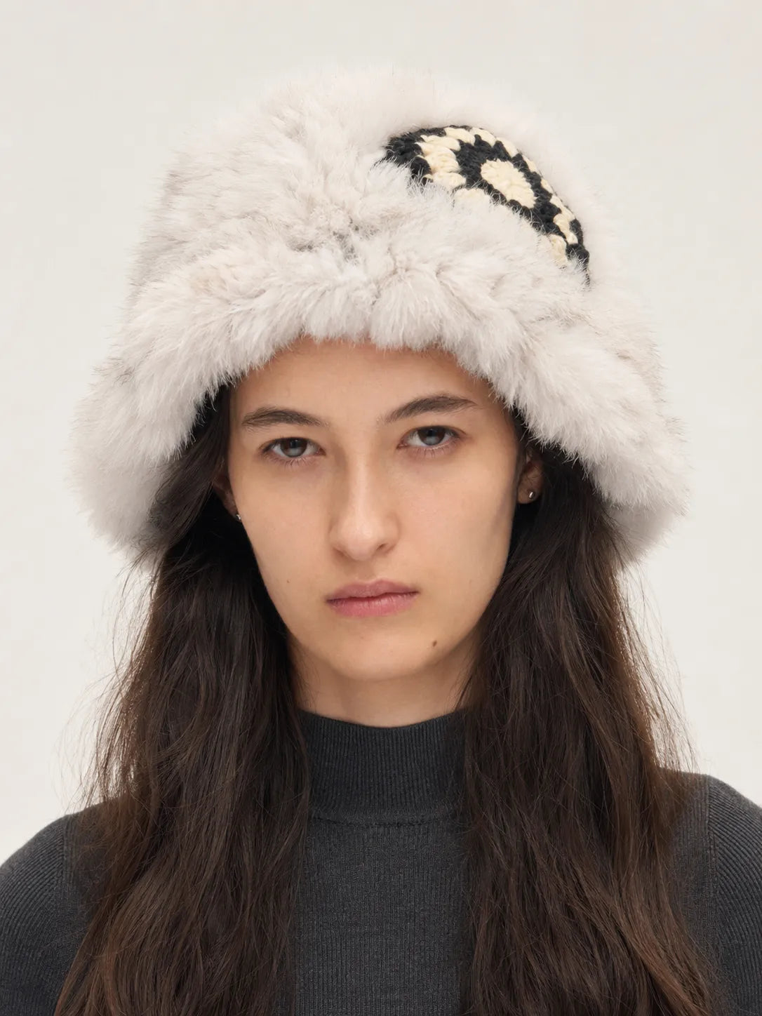 Woman wearing a milk tea rabbit fur knitted ethnic hat - Fireladyfur