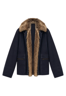 Model wearing the Firelady Fur Hearthside Simmer goose down parka with raccoon fur hood