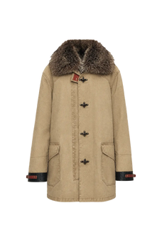 Model wearing the black Firelady Fur Hearthside Simmer down parka with raccoon fur hood
