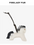A white faux-fur horse-shaped bag charm with black accents, including a black mane, black tail, and black hanging strap, shown on a light gray background with the brand name 'FIRELADY FUR' at the top.