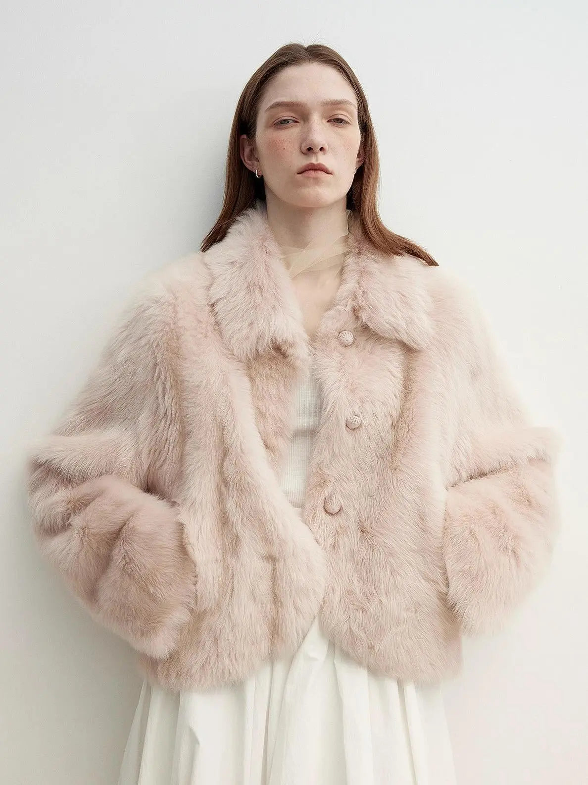 Model wearing the Autumn Secret dirty pink Toscana shearling jacket