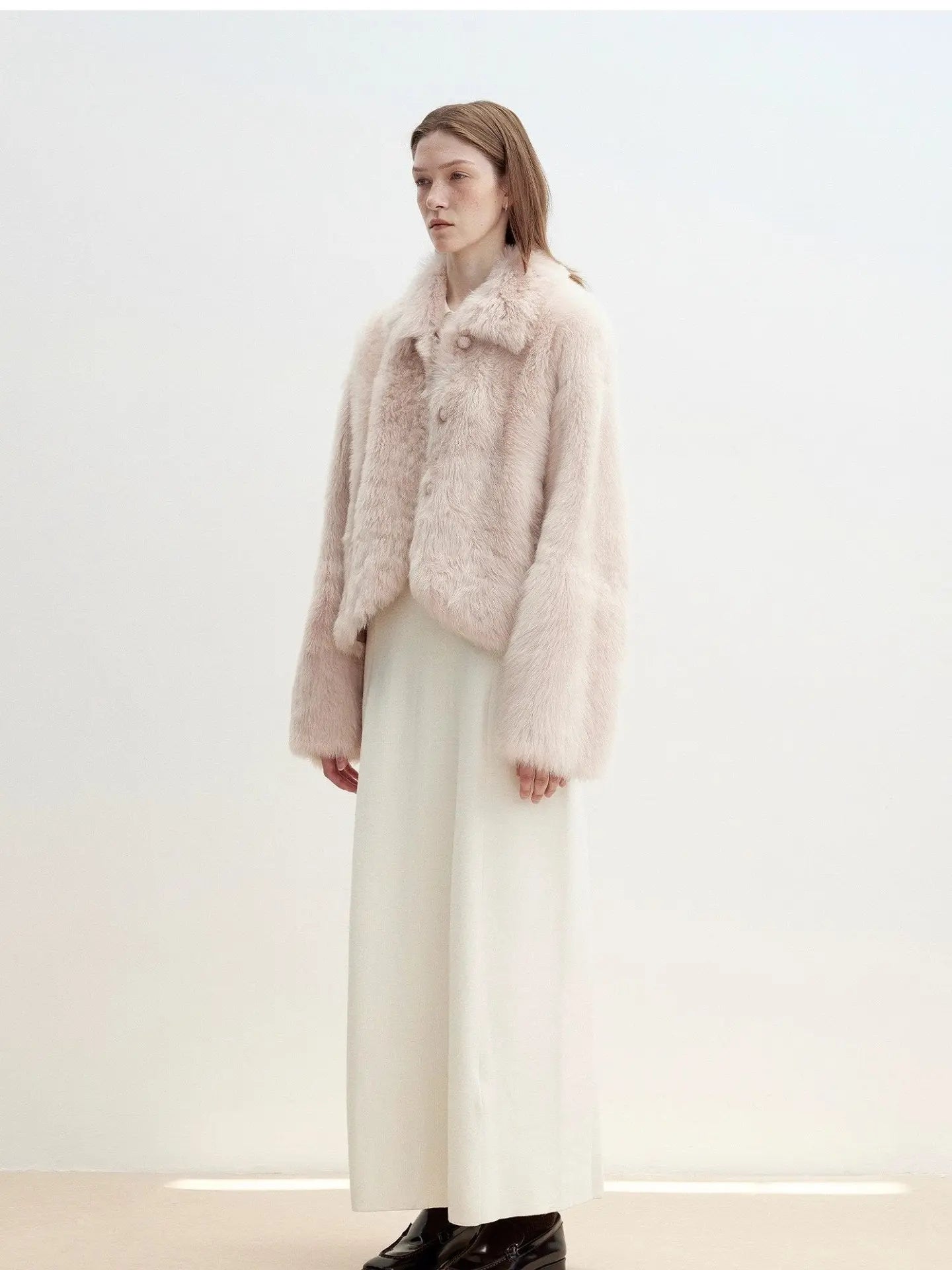 Pink Toscana shearling jacket showing straight short silhouette