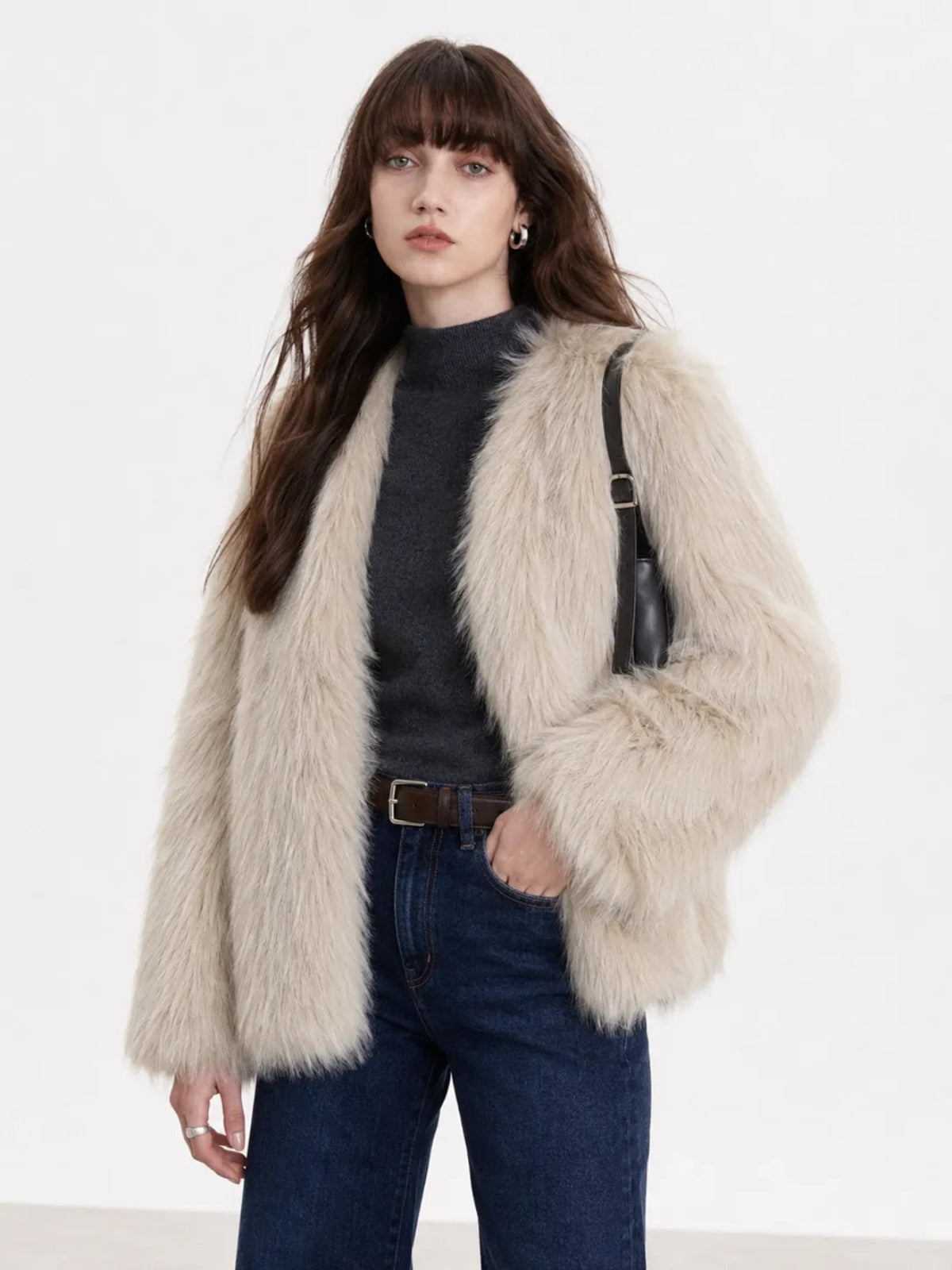 Model wearing Black Sugar Beige Apricot fox fur cardigan, front view