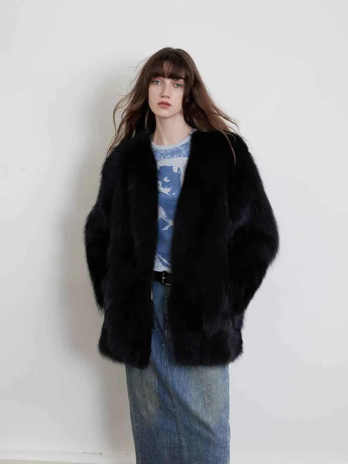Model wearing Black Sugar Black Extended fox fur cardigan, front view