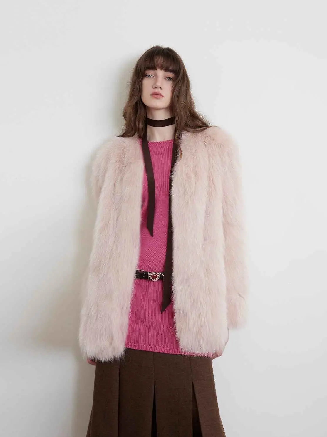 Model wearing Black Sugar Pink Extended fox fur cardigan, front view