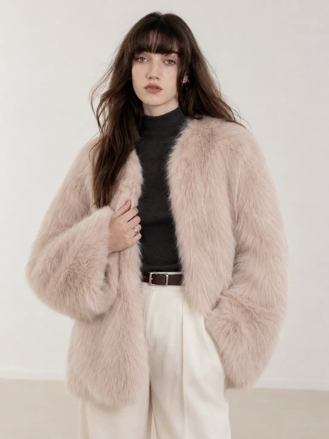 Model wearing Black Sugar Pink SagaFurs fox fur cardigan, front view