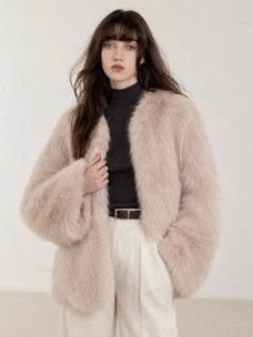 Model wearing Black Sugar Pink SagaFurs fox fur cardigan, front view