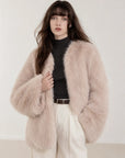 Model wearing Black Sugar Pink SagaFurs fox fur cardigan, front view