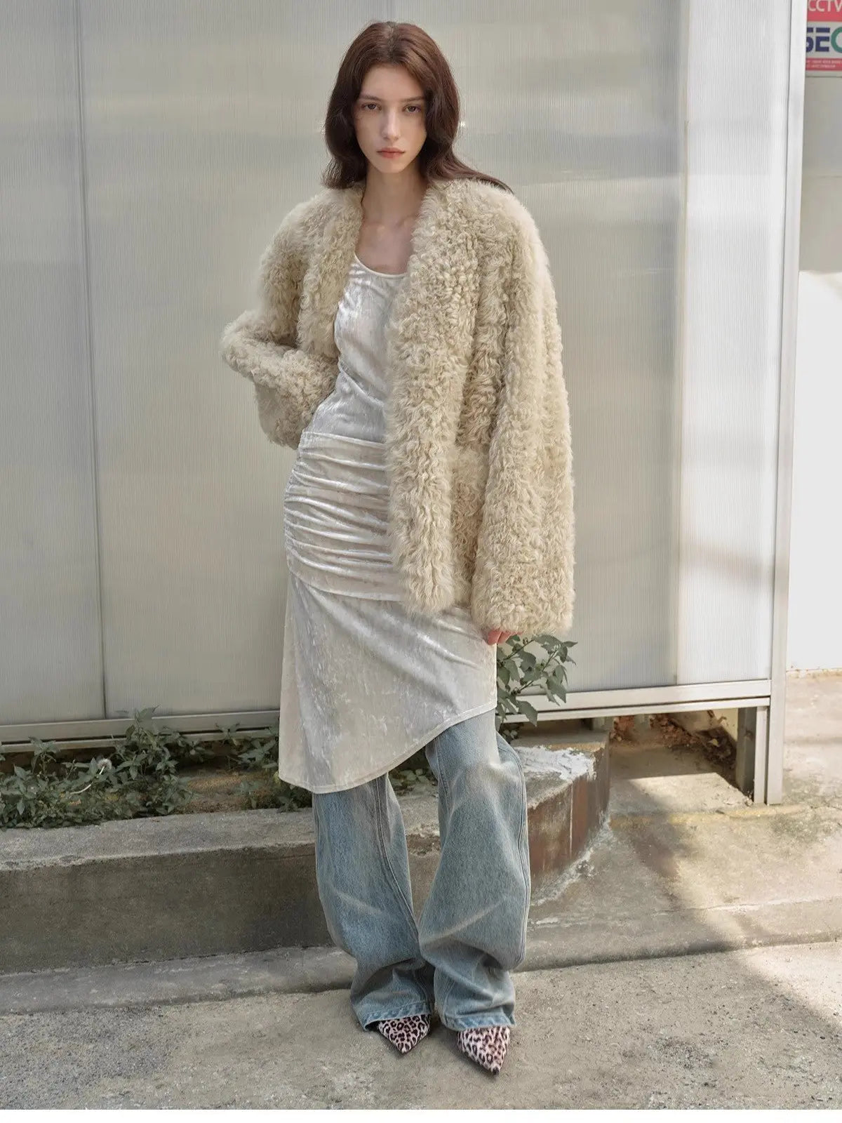 Model styling the Castle Dusk natural ivory V-neck Toscana shearling coat, full-length view