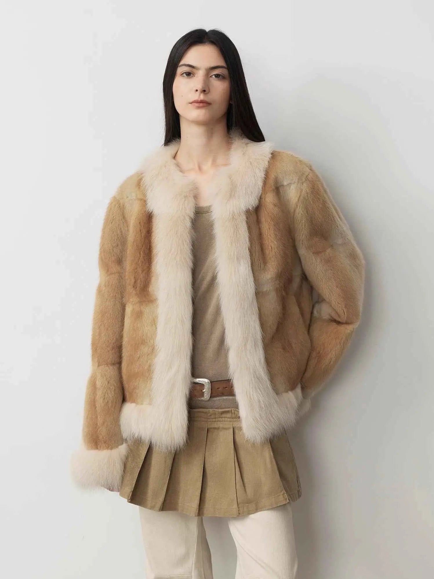 Model wearing Casual Gene Yellow Apricot muskrat and fox fur coat, front view