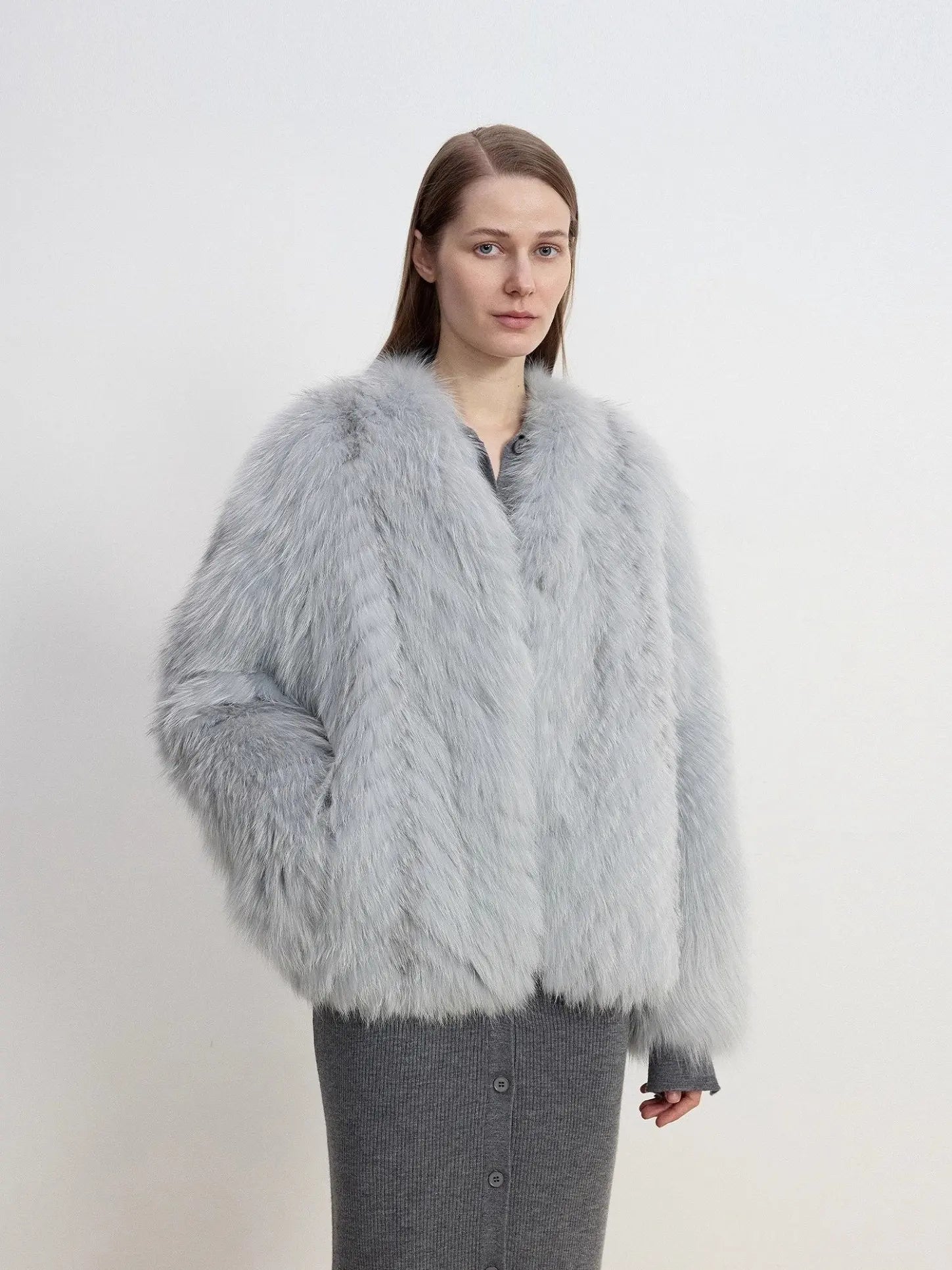 Champagne Ice Blue V-neck fox fur jacket, three-quarter model view