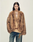 Model wearing Chic Sister Espresso V-neck fox fur coat, front view