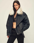 Studio model wearing Fireladyfur City Travel Denim Blue fox fur down parka front view