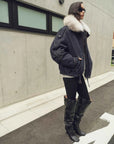 Outdoor side view of Fireladyfur City Travel Denim Blue fox fur down parka on model