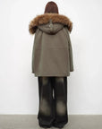 Fireladyfur Coastal Highway II raccoon fur collar parka profile view