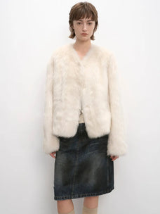 Woman wearing the Darcy Manor white Toscana shearling short coat, front view