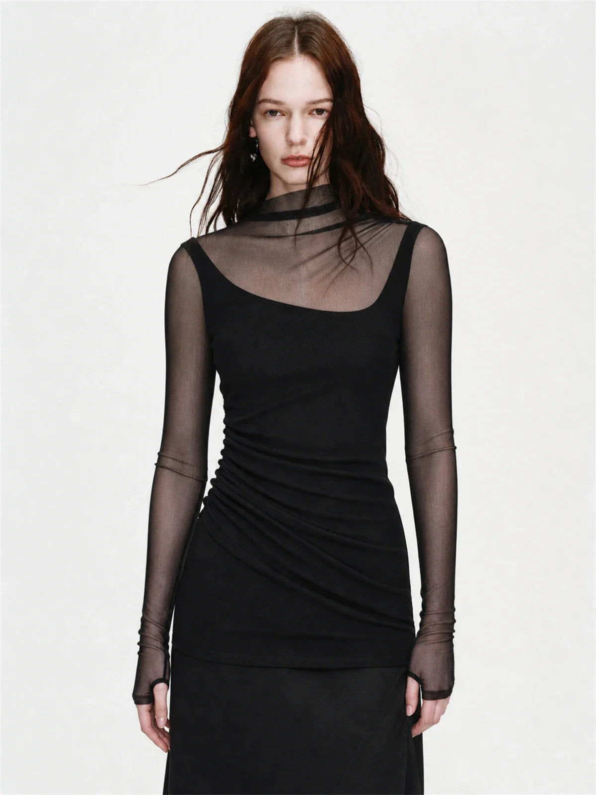 Black double-layer transparent oblique collar fake two-piece knit top on EVA model front view