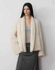 Dream Traveler Pearly White mink coat on model, front view