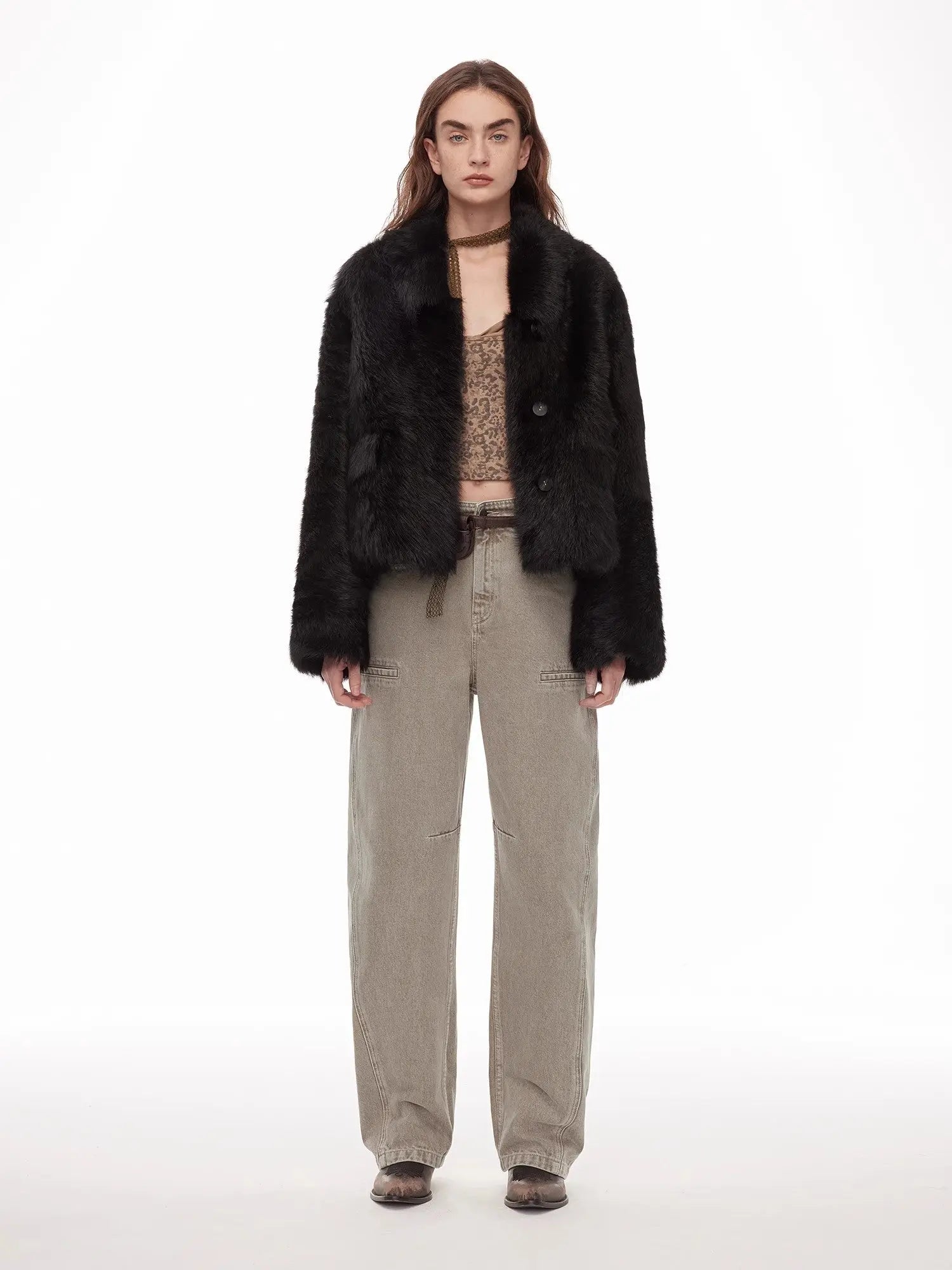 Woman wearing the Dream Walk texture black Toscana shearling coat, front view