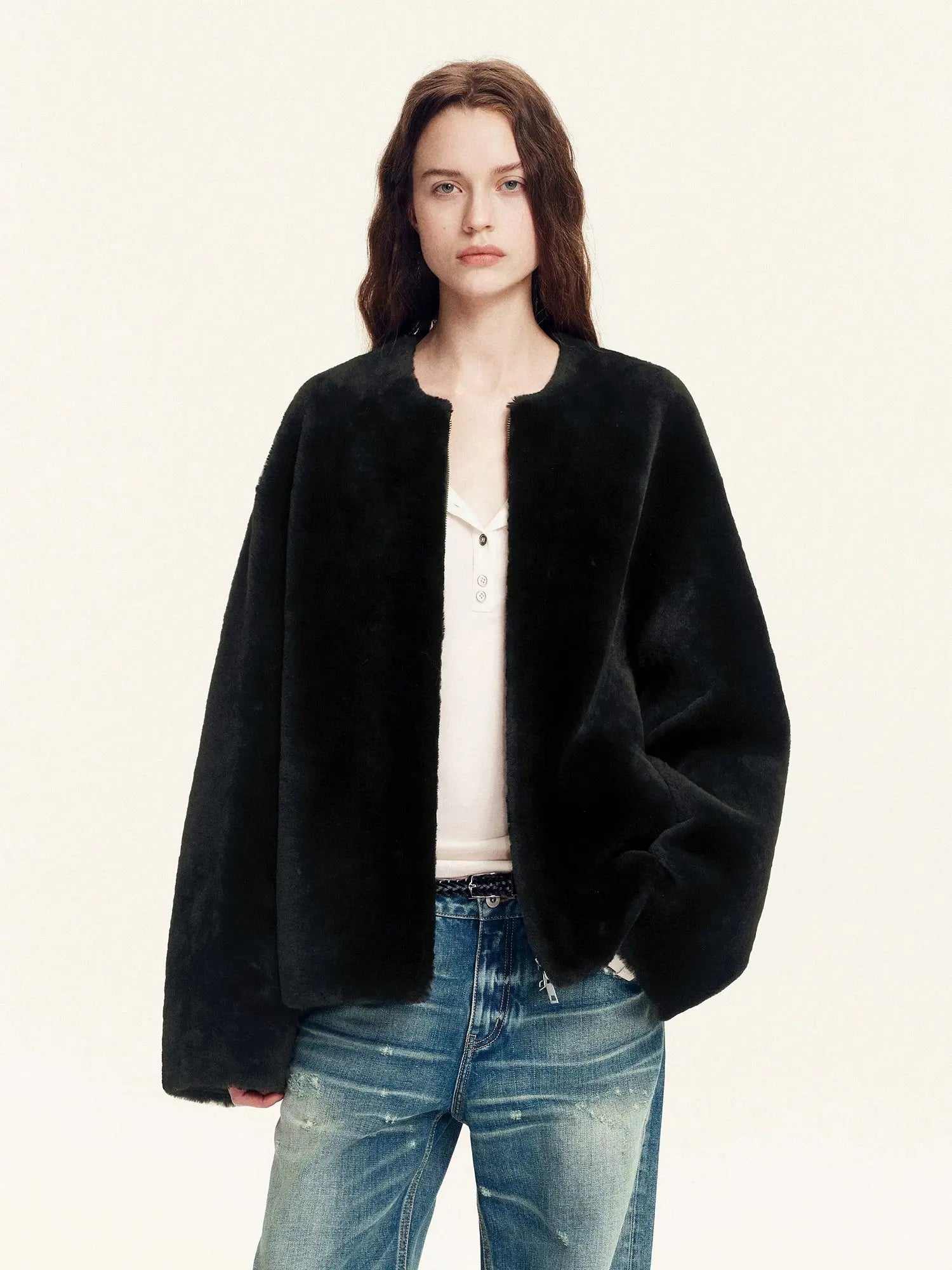 Black Merino shearling jacket styled with denim
